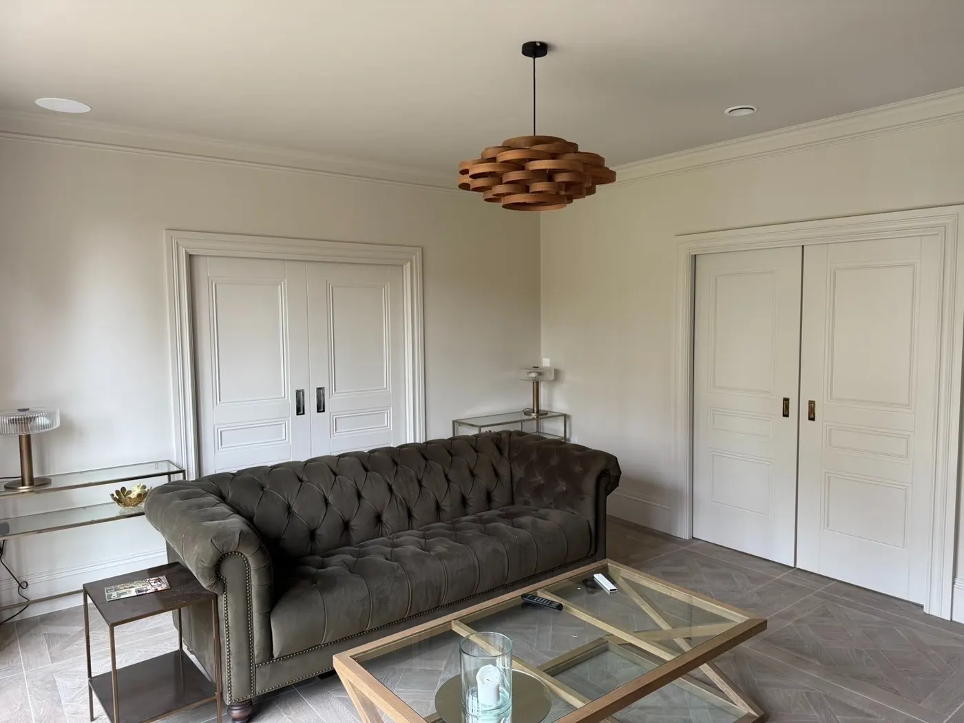 Elegant panelled living room in soft neutral tones, freshly painted and decorated by Martin And Co. Decorating